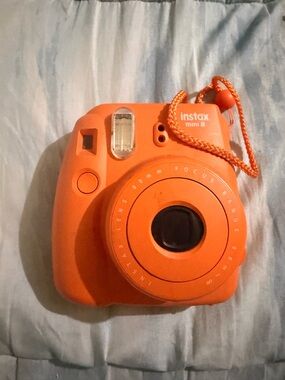 Fujifilm Instax Mini 8 Instant Camera in Bright Orange with Matching Wrist Strap